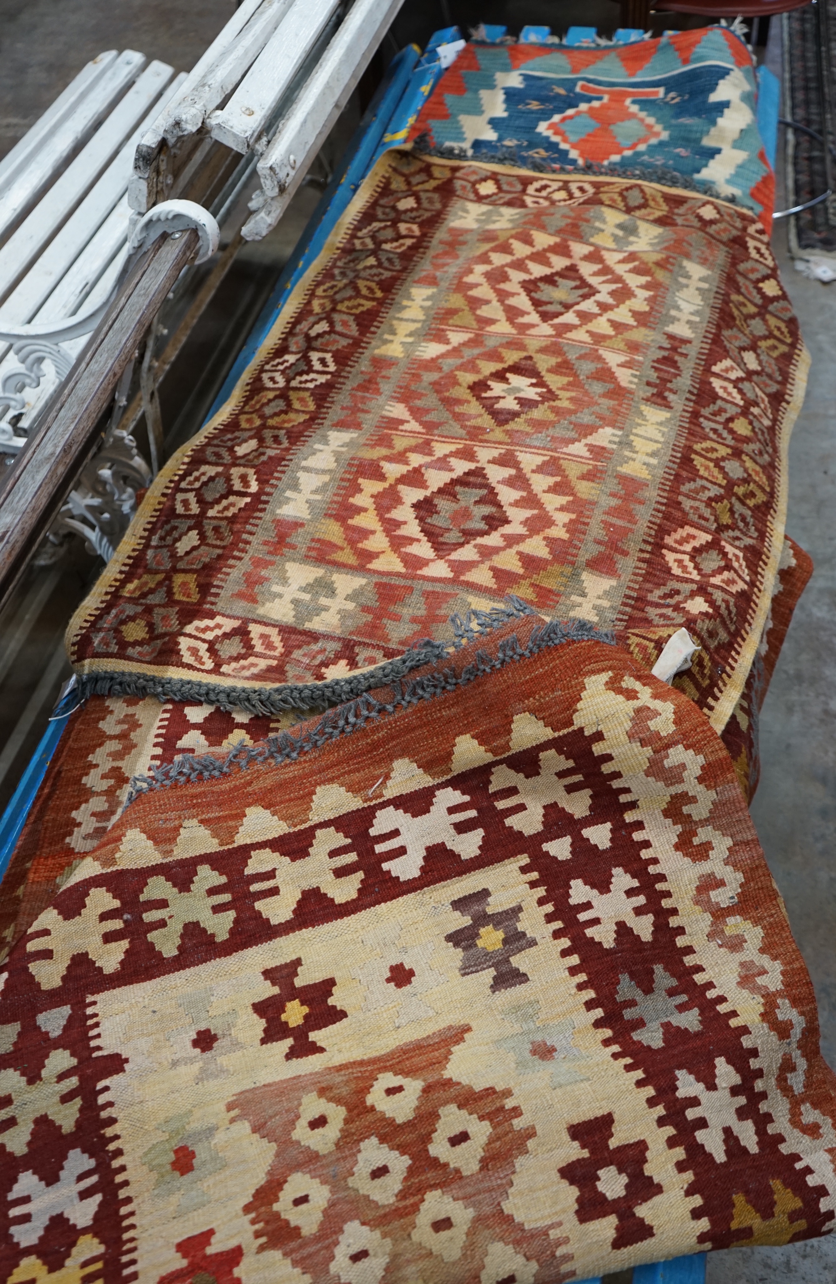 A Kelim flatware runner, 280 x 80cm and two smaller Kelim flatweave rugs